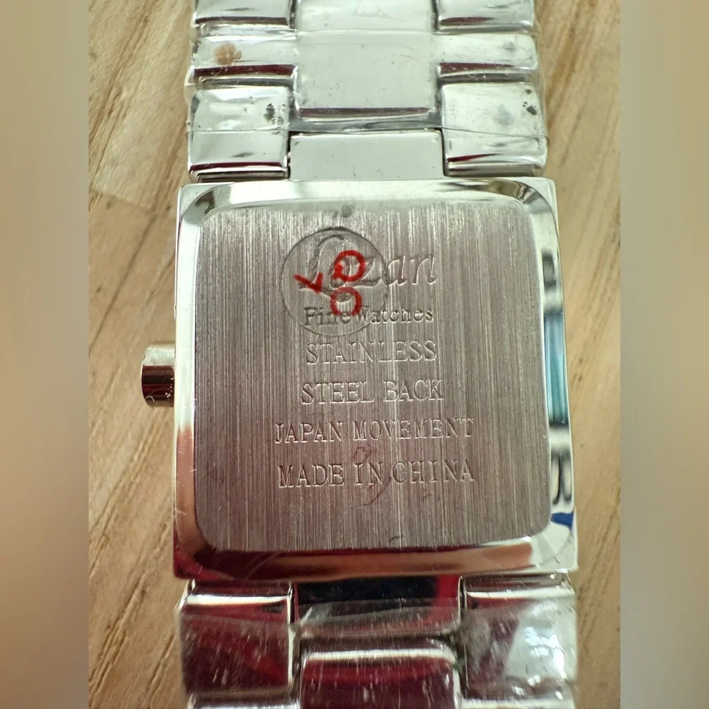 Lozan ladies silver tone square watch NEW BATTERY